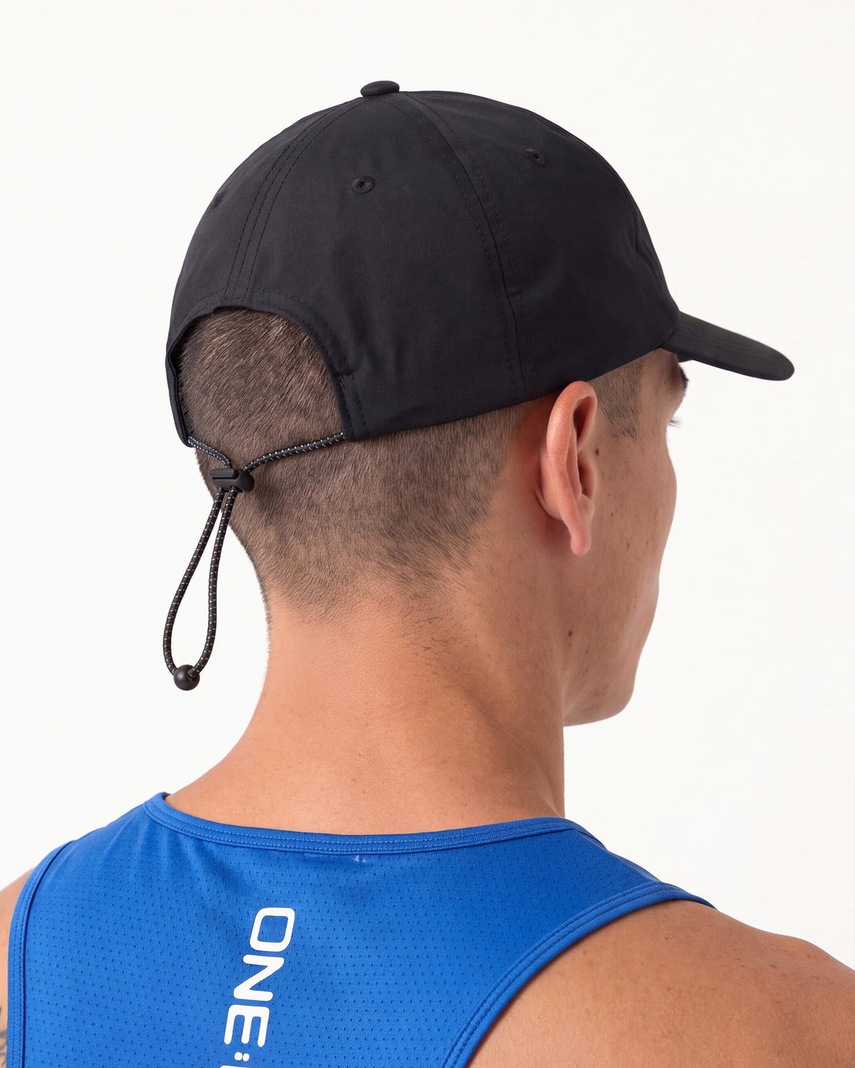 BUNGEE CORD BUCKLE · ONE PULL, HOLDS AT PACE